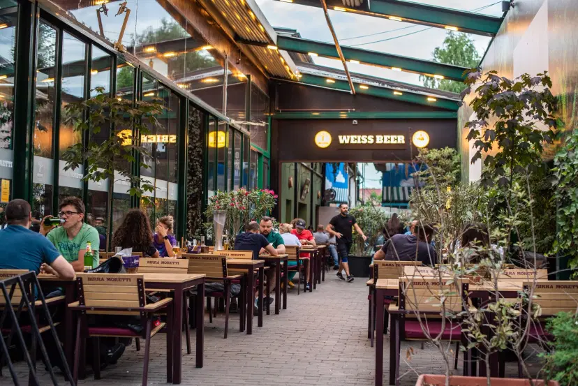 https://honeypot0.s3.amazonaws.com/1701080747978-gallery-WEISS%20BEER%20GARDEN%20%282%29.webp