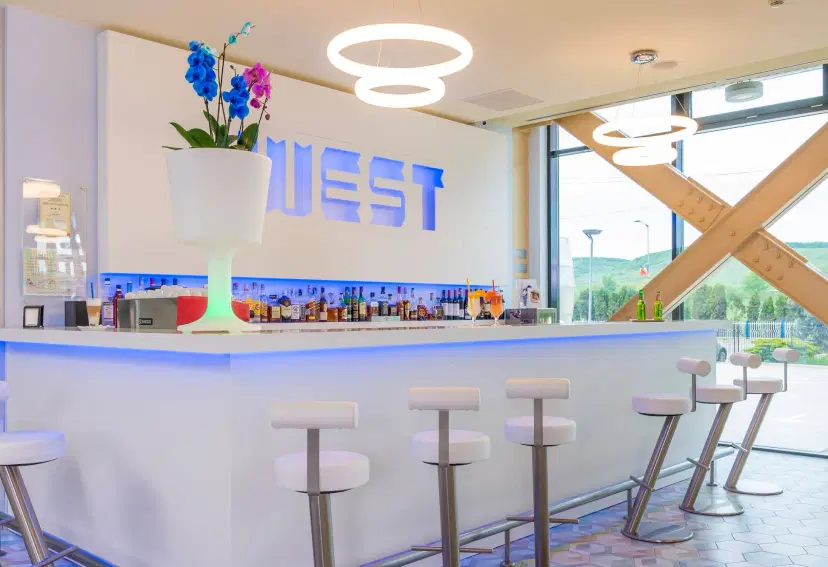 https://honeypot0.s3.amazonaws.com/1702466291985-gallery-WEST%20CITY%20HOTEL%20%281%29.webp