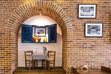 https://honeypot0.s3.amazonaws.com/1704890669734-gallery-Nikos%20Greek%20Taverna%20%281%29.webp